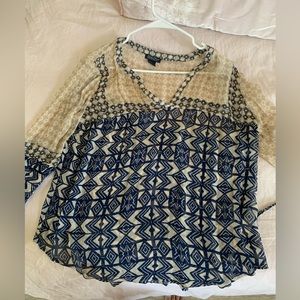 Luckybrand tunic style woman’s shirt. Chiffon with a graphic dark blue pattern